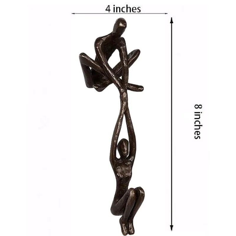 Man Lifting Woman Figurine