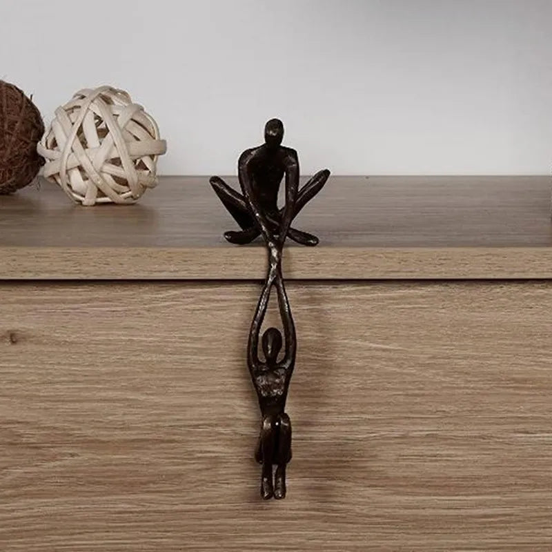 Man Lifting Woman Figurine
