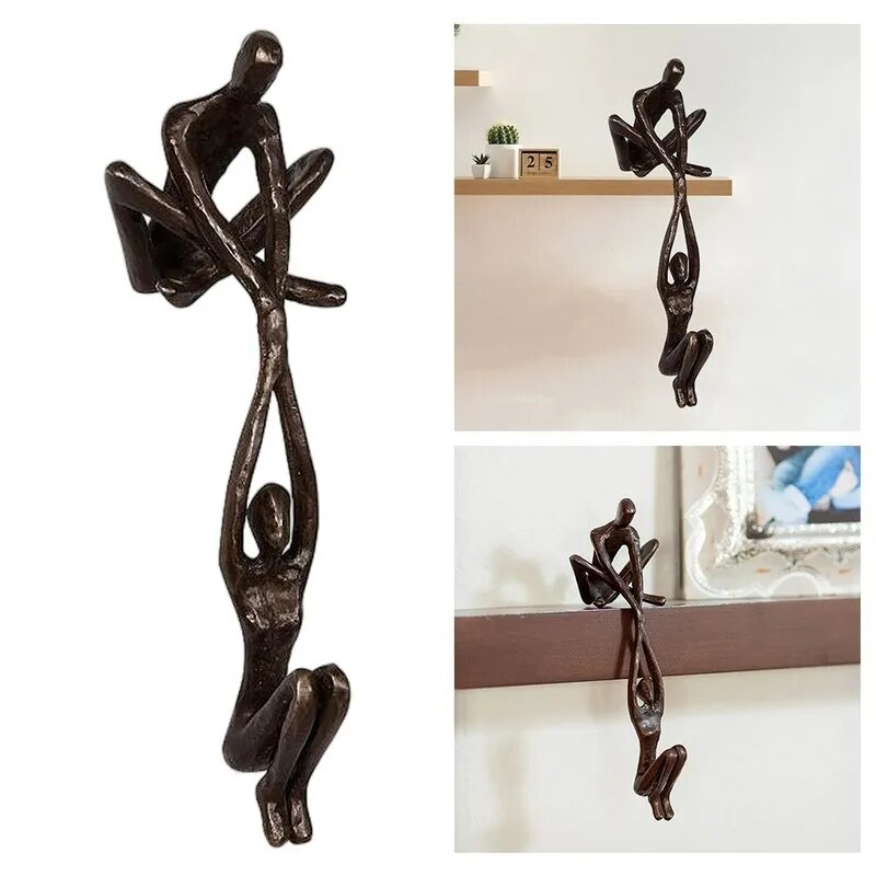 Man Lifting Woman Figurine