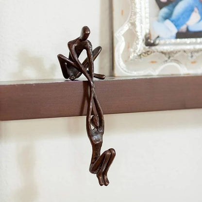 Man Lifting Woman Figurine
