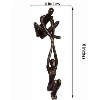 Man Lifting Woman Figurine